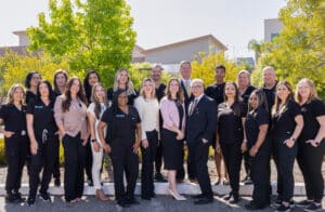 The entire Renuance team together outside in front of the practice in Murrieta