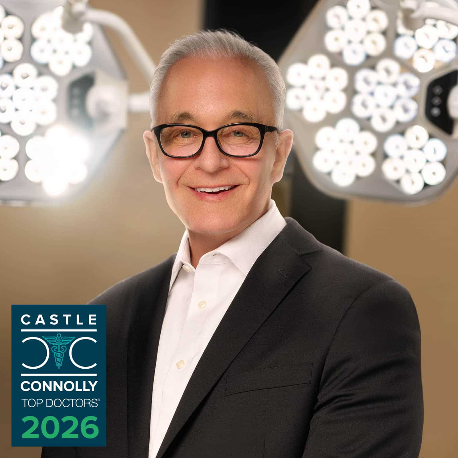 Michael E. Hill headshot with Castle Connolly Top Doctors 2026 award badge