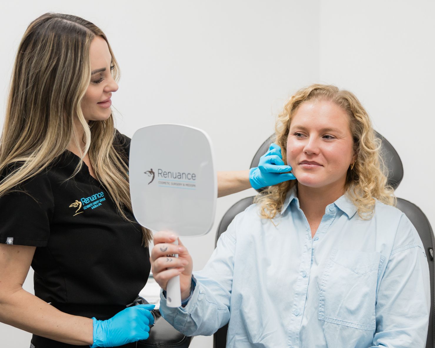 Chelsea Delaney, RN with a patient