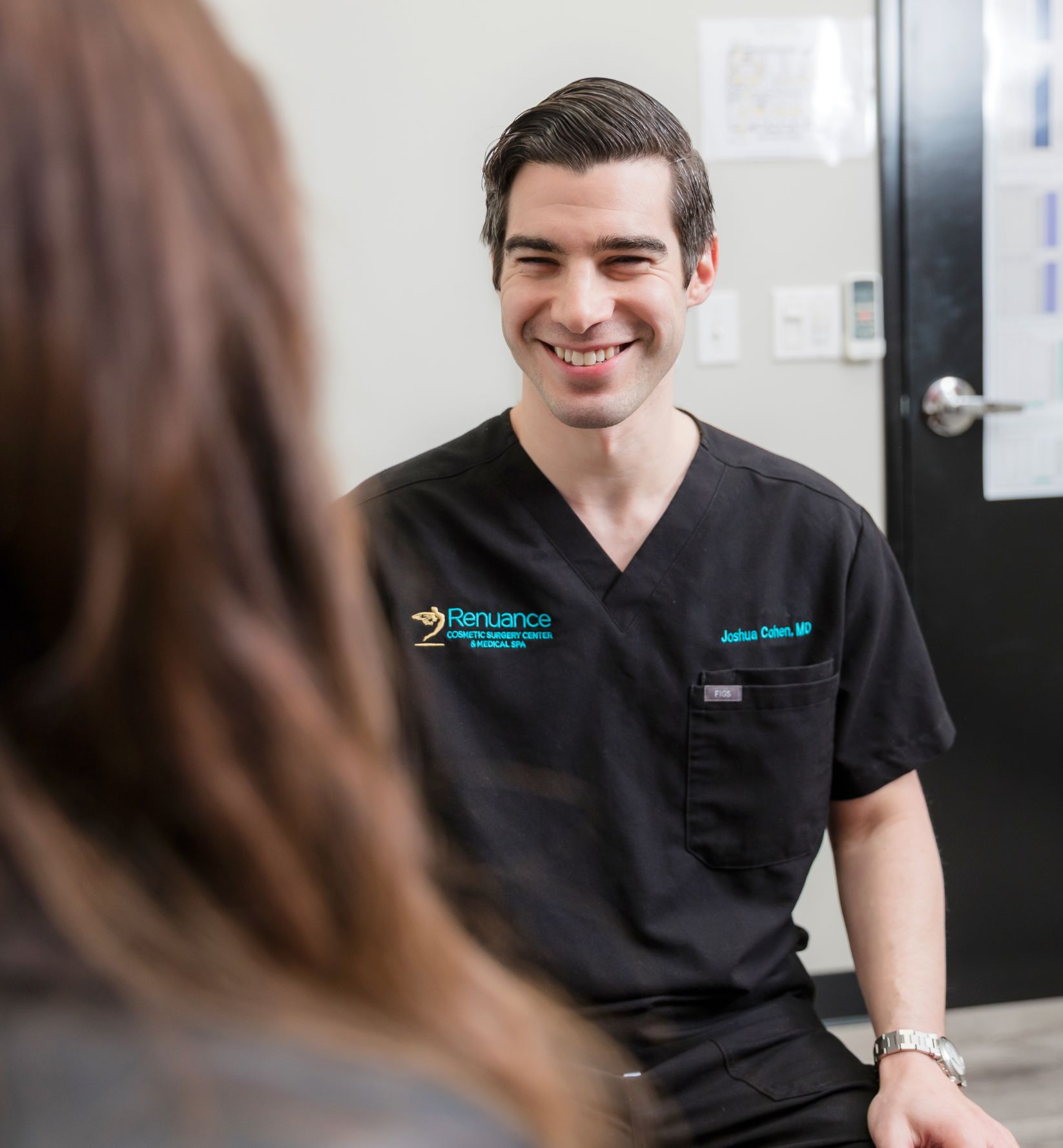 Dr. Cohen with a patient