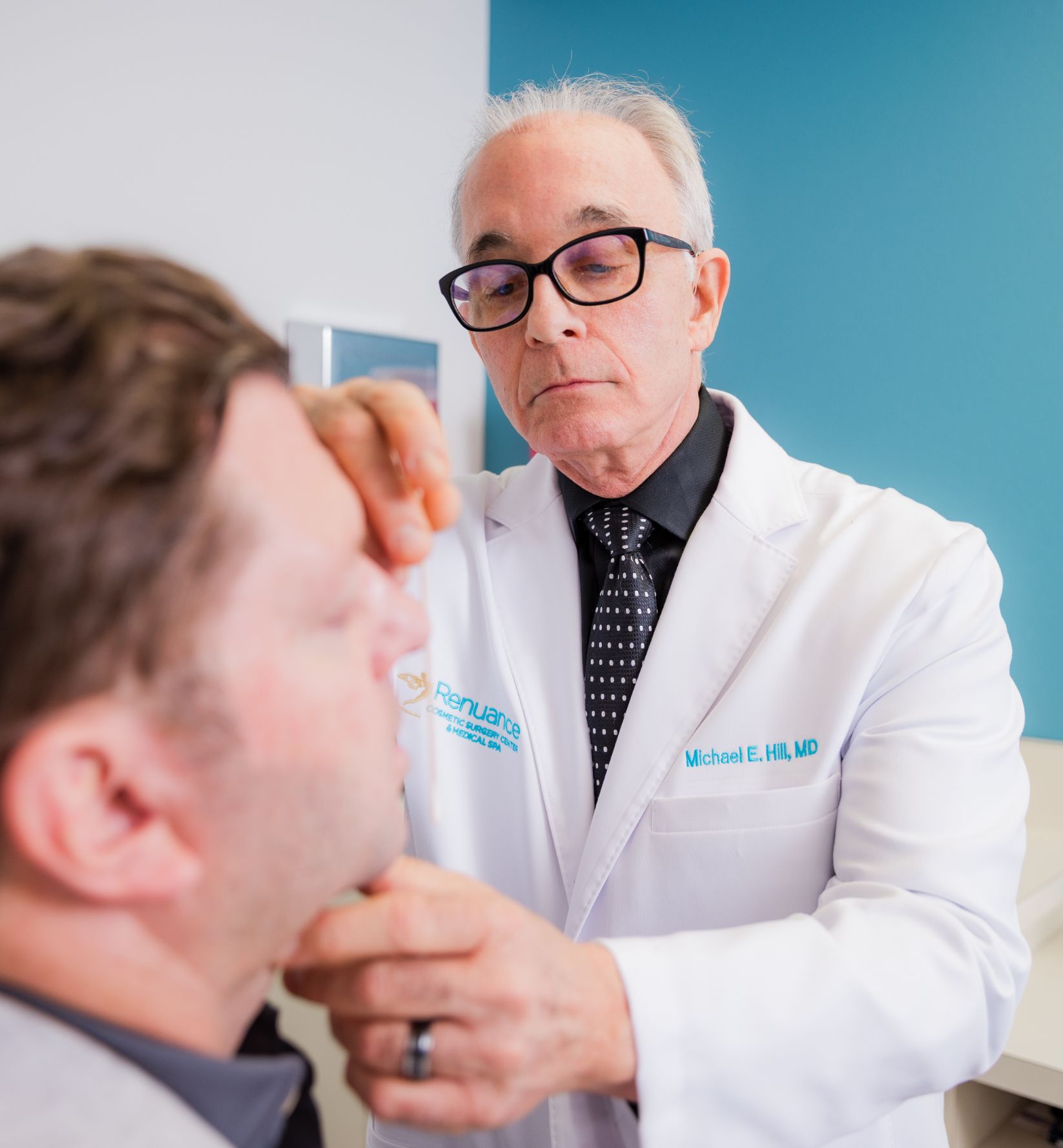 Dr. Hill with a patient