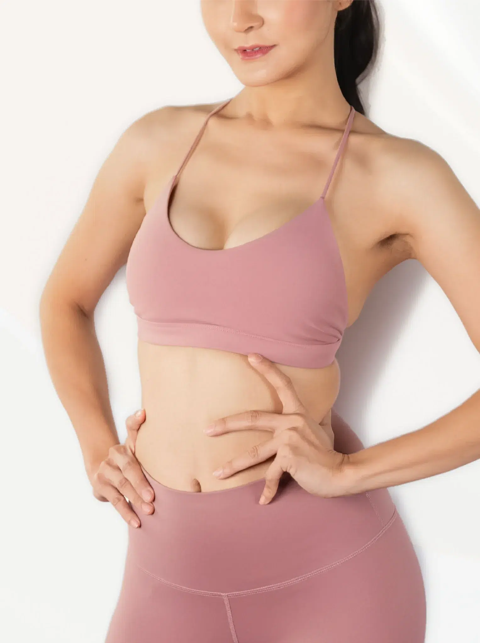 woman wearing a pink workout outfit